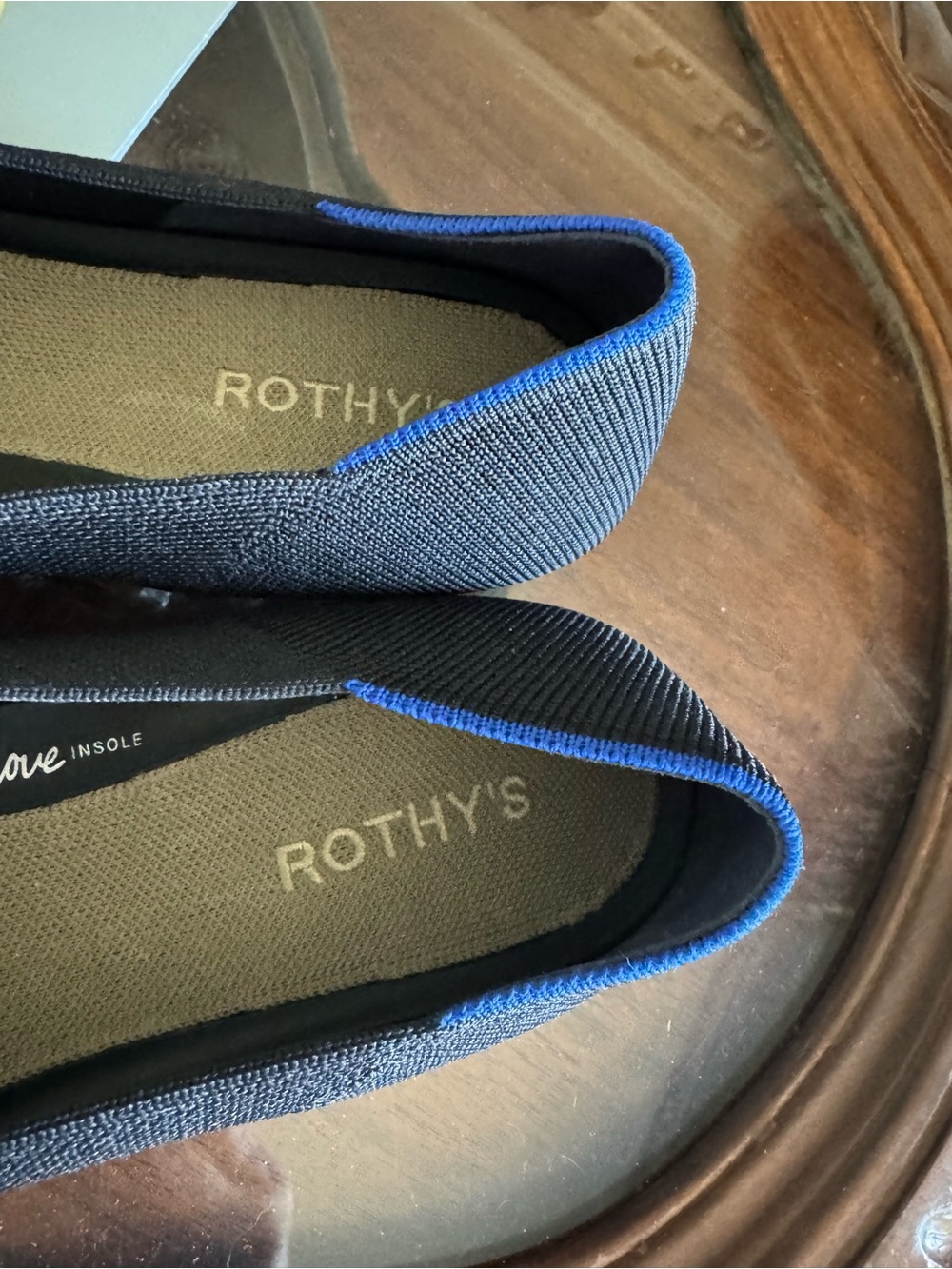 Rothy's Black Pointed-Toe Flats with Brass Buckle and Blue Trim - Picture 4 of 8
